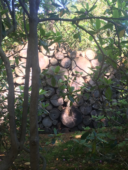 log wall at Sakonnet Garden